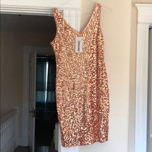 Rose gold bodycon dress. NEW with tags